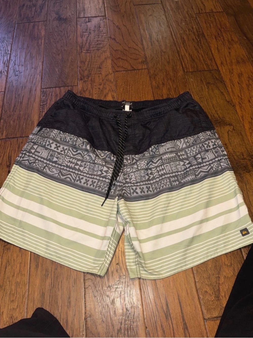 Men's Black and Light Green Striped Swim Trunks